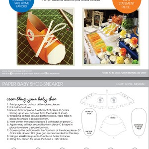 May include: A printable template for making paper baby shoes. The template includes instructions for assembling the shoe, which is made of orange and white cardstock. The shoe is decorated with a red heart and the words "Welcome Baby".