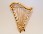 Vintage Monet Harp Brooch Signed Rhinestone Gold