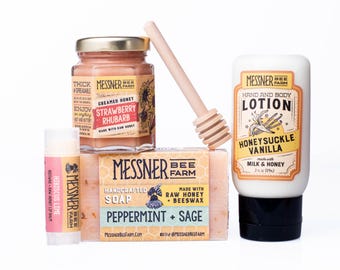 Bee Happy Gift Set! Comes with Soap, 3oz. Creamed Honey with tiny dipper, 2oz. Lotion, Lip Balm in a pink bag!