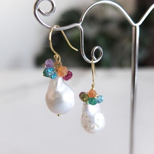 Baroque pearl earrings with gemstone cluster