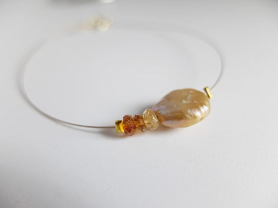bracciale minimalista con perla dorata e citrino
