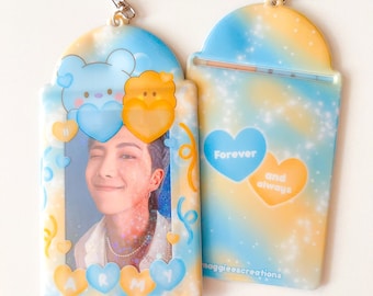 May include: A blue and yellow photo card holder with a picture of a man in the window. The holder has a keychain and says "Forever and Always" and "Maggiescreations".