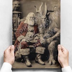 May include: Sepia-toned print featuring Santa Claus seated next to a horned, furry creature. Santa wears a red coat with fur trim and boots. The other figure has large horns, a stern expression, and wears a leather harness.