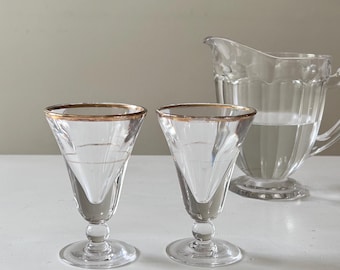 Vintage set van 2 Franse pastisglazen, bedrieglijke glazen met gouden rand