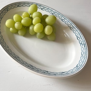 Vintage French oval ironstone platter by St Amand, green border