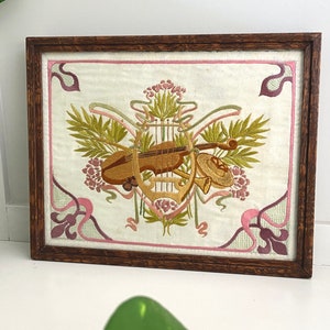 Antique embroidery with musical instruments, silk needlework in oak frame, violin, harp embroidery