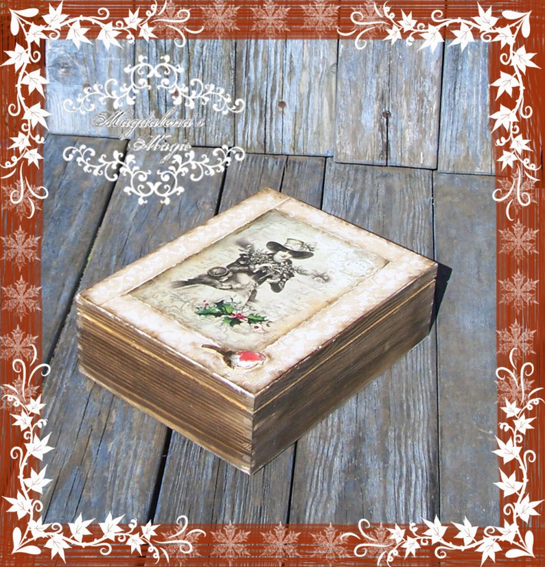 May include: A wooden box featuring a vintage-style image of a woman in a hat and a floral design. The box has a distressed brown finish and a white border around the image.