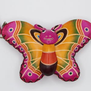 Monedero/pulsera/billetera de cuero genuino hecho a mano con forma de mariposa
