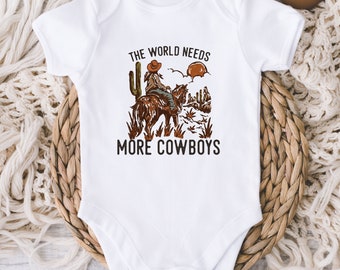 The World Needs More Cowboys Baby Onesie® - Vintage Desert Cowboy Bodysuit - Little Cowboy - Country Farm Baby - Baby Boy Baby Shower Gift