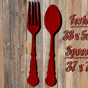 May include: Red wooden fork and spoon wall decor. The fork measures 38 inches by 5 1/2 inches and the spoon measures 37 inches by 7 inches.