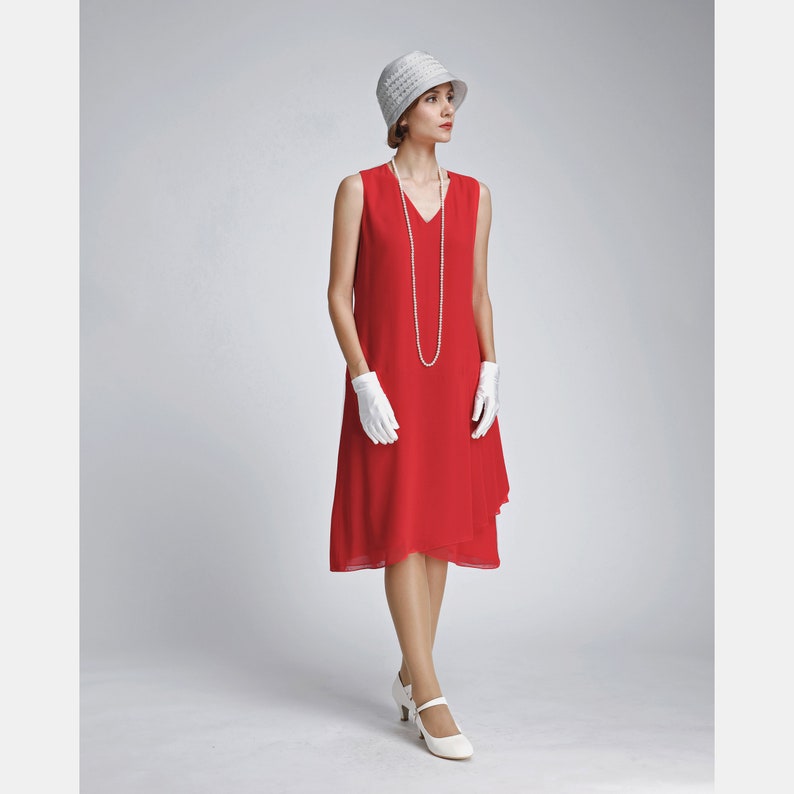 red dress 1920s Roaring 20s satin in dark with handkerchief skirt The fabric is comfortable for the skin Figurestock | A vintage 1920s