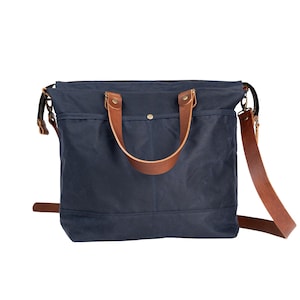 Navy blue waxed canvas and leather crossbody bag with pockets, Minimalist cross body travel bag, Water resistant heavy duty messenger bag