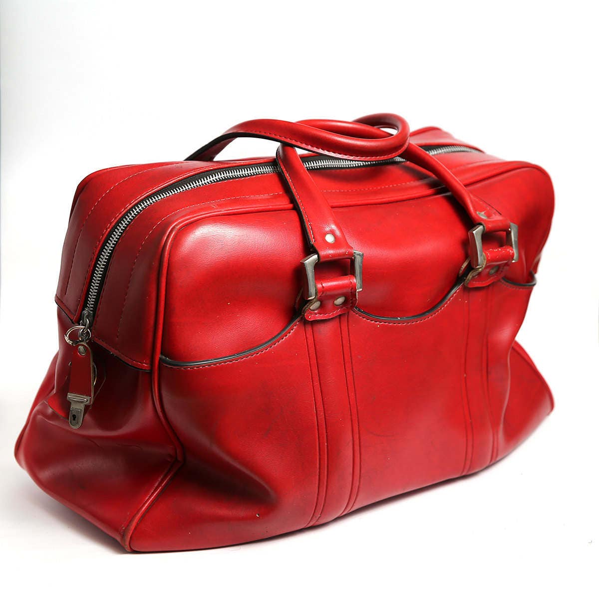 red leather suitcase