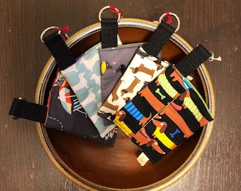 Dog poop/waste bag holders 100% cotton with a variety of Doxie and Pug prints.