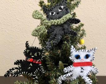 Christmas handmade felt cat ornaments/wall hangings/decorations with a variety of accents.