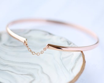 Glamour Bangle in Rose Gold: A classic stacking bangle handmade with Rose Gold Fill in an Adjustable Size by Leah Yard Designs in Vancouver