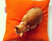 Pussa feel good cushion, orange, medium 60 x 60cm, cover made of 100% reused wool and washable hypoallergenic filling.