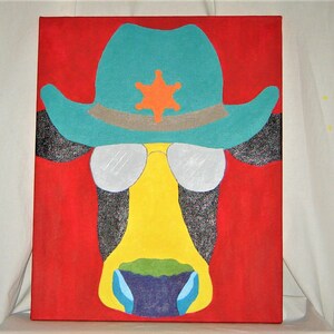 May include: A colorful painting of a cow wearing a turquoise cowboy hat with a sheriff's star, sunglasses, and a yellow face. The background is red.