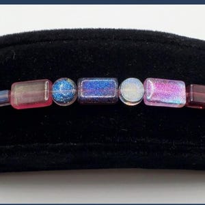 Armband met glazen kralen en knevelsluiting