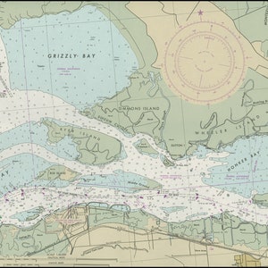 May include: A nautical chart of the Suisun Bay area in California, showing the waterways, islands, and depths. The chart includes a compass rose, depth soundings, and navigational aids.