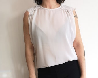 Women's White sleeveless Round Neck Blouse. White sleeveless top.