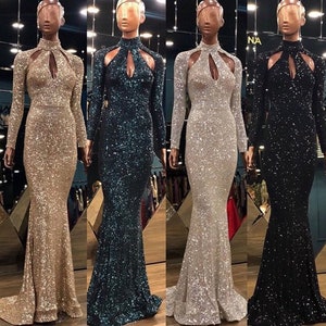 May include: Four long-sleeved sequined dresses in gold, teal, silver, and black. Each dress has a high neckline with a keyhole cutout and a fitted silhouette.