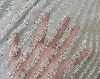 Magnifique tissu de dentelle de perles de paillettes de cristal transparent, 1 mètre, tissu de dentelle de perles à rayures épaisses, broderie de robe de mariée de mariage dentelle, dentelle blanc cassé