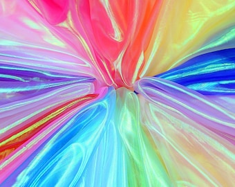 May include: A close-up of iridescent fabric in a rainbow of colors, including pink, yellow, blue, and green. The fabric is sheer and has a slight shimmer to it.