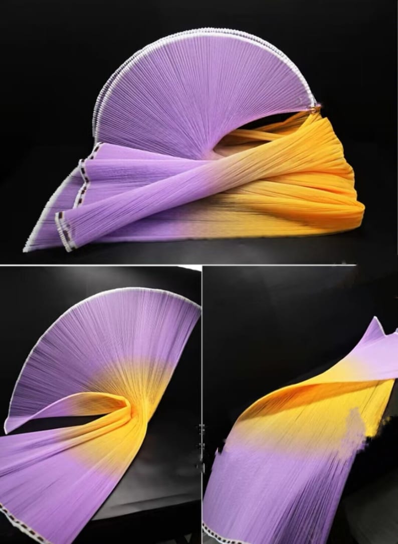 Peut inclure: Un &eacute;ventail en tissu pliss&eacute; d&eacute;grad&eacute; de violet &agrave; jaune. Le tissu est doux et fluide, et l'&eacute;ventail est parfait pour la danse ou les spectacles sur sc&egrave;ne.