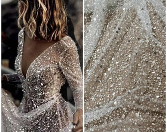 white sparkly dress with sleeves