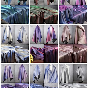 May include: Nine different iridescent fabrics in various colors, including blue, green, purple, and silver. Each fabric is draped over a mannequin or laid flat on a table. The fabrics have a shimmering, holographic effect.