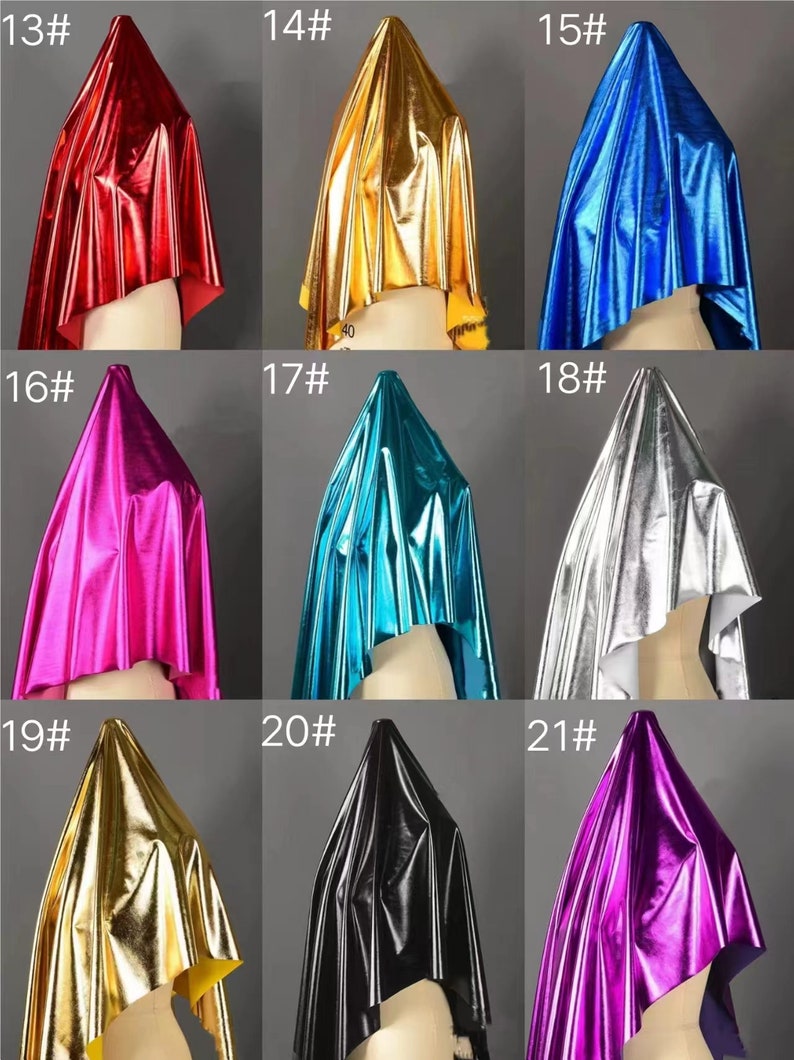 May include: A collection of 9 fabric swatches in various metallic colors, including red, gold, blue, pink, turquoise, silver, gold, black, and purple. Each swatch is draped over a mannequin head, with the number of the swatch displayed above it.