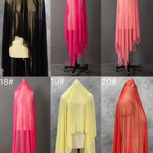 May include: Six different colors of sheer fabric draped over a mannequin. The colors are black, pink, light pink, hot pink, yellow, and red.