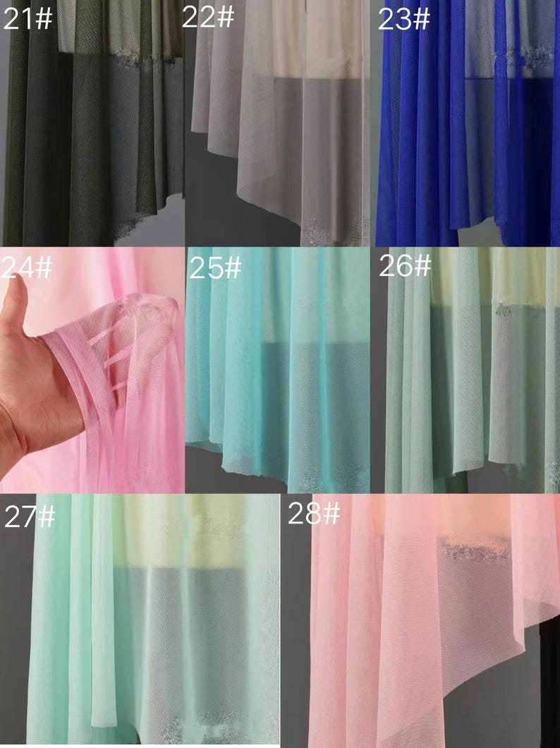 May include: A collection of eight different sheer fabrics in various colors, including green, gray, blue, pink, and turquoise. The fabrics are arranged in rows of two, with each fabric labeled with a number from 21 to 28.
