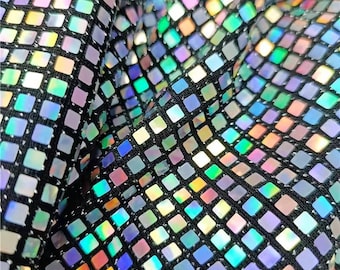 Skimrande silverfärgat fyrkantigt spegelpaljetttyg, 4 mm paljetter som fästs på, 2-vägs stretchigt glänsande spetsigt stickat tyg, glittrigt balklänningstyg