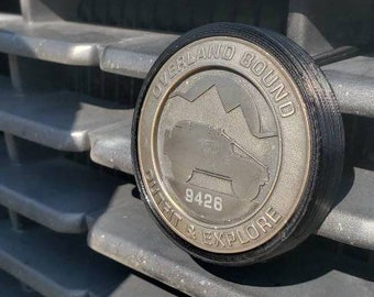 Badge grill mount