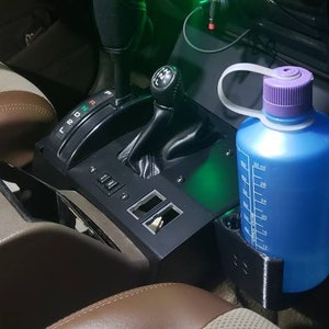 Panel mounted cup holder