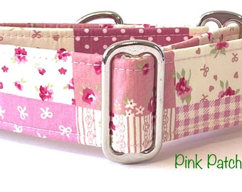 May include: A pink patchwork dog collar with silver hardware. The collar has a variety of pink and white floral patterns. The text "Pink Patchwork" is visible below the collar.