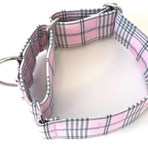 May include: Pink and gray plaid dog collar with a silver buckle and D-ring.