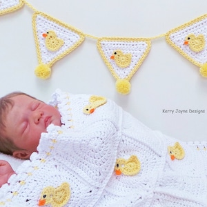 May include: A white crocheted baby blanket with yellow crocheted duck appliques. A yellow and white crocheted duck bunting hangs above the blanket. The text "Kerry Jayne Designs" is visible in the image.