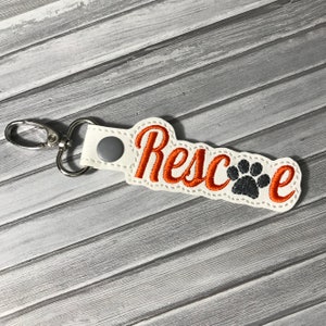 Rescue with Paw Print Keychain