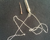A Single Blackthorn Thorn Talisman for Protection encased in a Glass Pendant