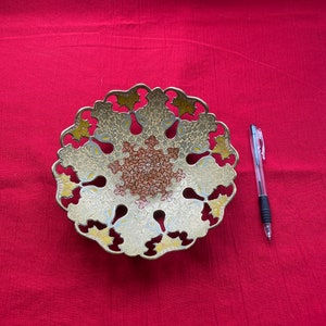 Brass ornamental offering plate bowl