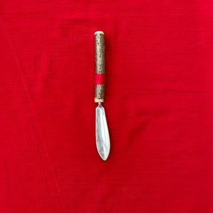 A unique Athame with hazel wood handle.