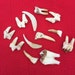 An interesting collection of 12 English wild deer and fox teeth. 