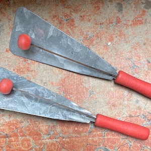 Vintage Pair of Party or New Year's Noise Makers, Wood Handle Galvanized Spatula shape Paddle