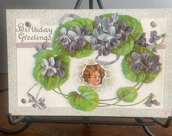 BD45G, Antique, Embossed Birthday Postcard, Birthday Greetings, Little Girl, Purple Flowers And Green Leaves