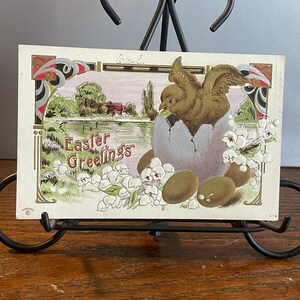 EA40G, Cartolina di Pasqua antica, leggermente in rilievo, Pulcino d'oro che cova dalle uova d'oro, Cabina sul lago, Auguri di Pasqua