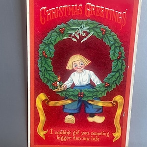 CH108G, Postal navideña antigua, Saludos navideños, Niño holandés, Zuecos, Corona navideña, Cinta dorada, Samson Bros, Alemania