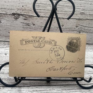 USPC11G, Antiquität, 1800er Jahre, US-Postkarte, 1 Cent, Gummi und Celluloid Harness Co